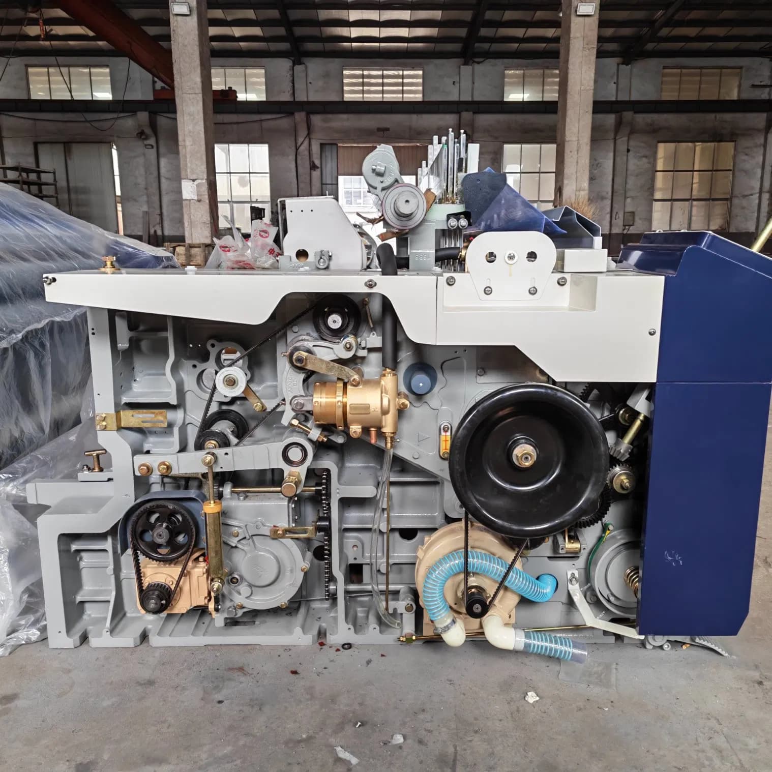 China Hongyuxing Best Manufacturer Factory Cheap Water Jet Loom High Speed Loom Heavy Loom