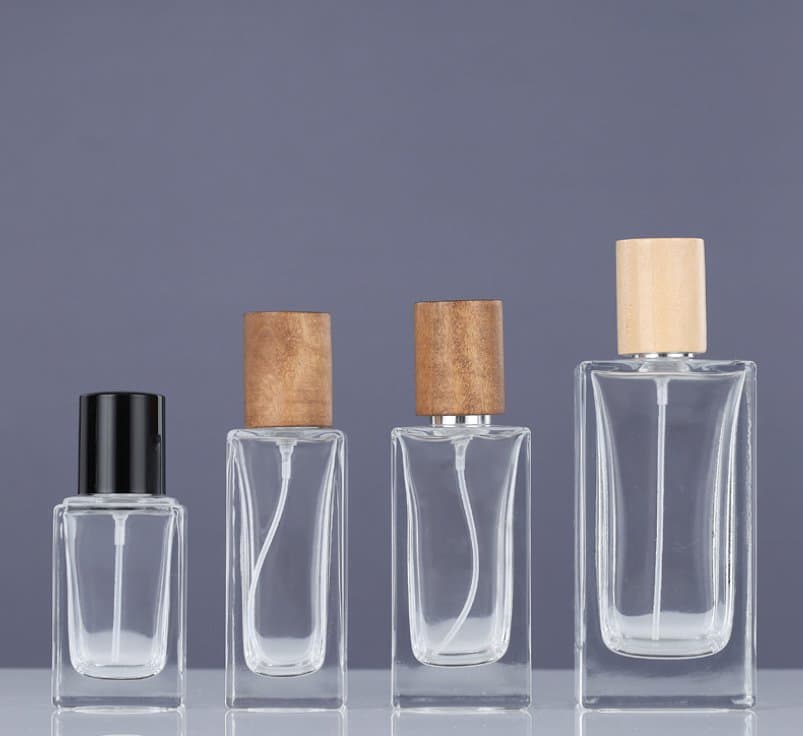 Top Seller DIY Empty 20 Ml 30 Ml 50 Ml Glass Perfume Bottle Packaging Round Transparent Portable Push Perfumes Spray Bottle