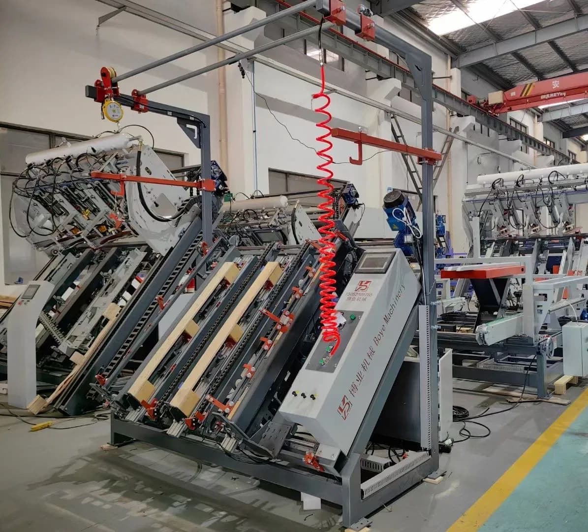 Hand-Operated Nail Driver for Wooden Pallets and Automatic Palletizing Machine